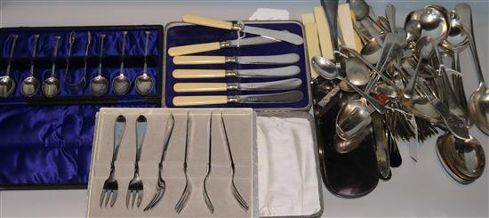 A set of six silver seal top coffee spoons and sugar tongs, cased and sundry cased and loose plated flatware, crumb scoop etc